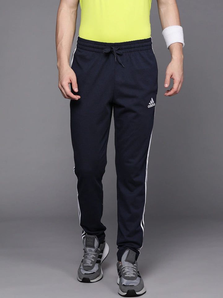 Adidas Solid & Casual Men Track Pants color Navy Blue & Grey
